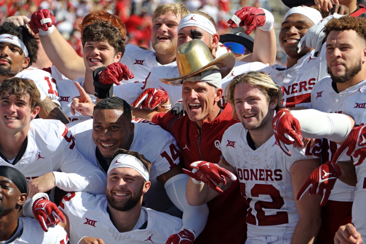 Oklahoma coach Brent Venables poses for a photo wearing the Golden Hat Trophy after the Red River Rivalry college football game between the University of Oklahoma Sooners (OU) and the University of Texas (UT) Longhorns at the Cotton Bowl in Dallas, Saturday, Oct. 7, 2023. Oklahoma won 34-30.